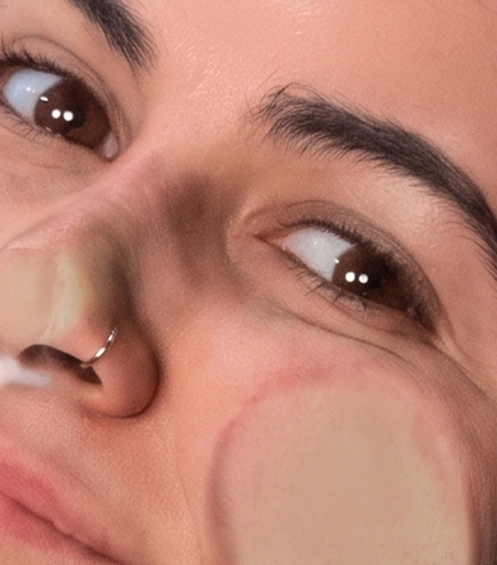 Kerrie, extreme close-up of her eyes and nose ring
